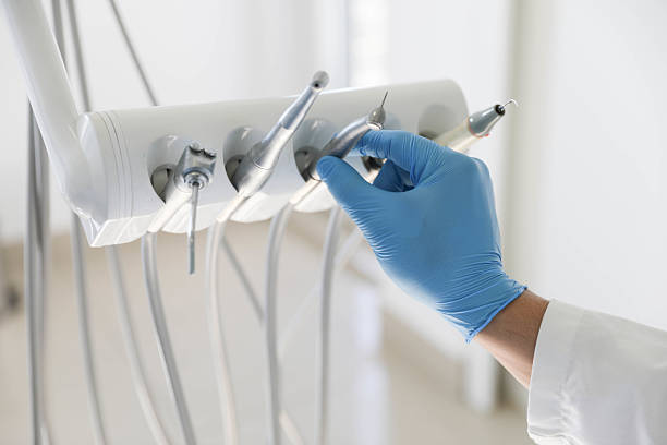 Professional Tooth Extraction technician working in Harristown, IL